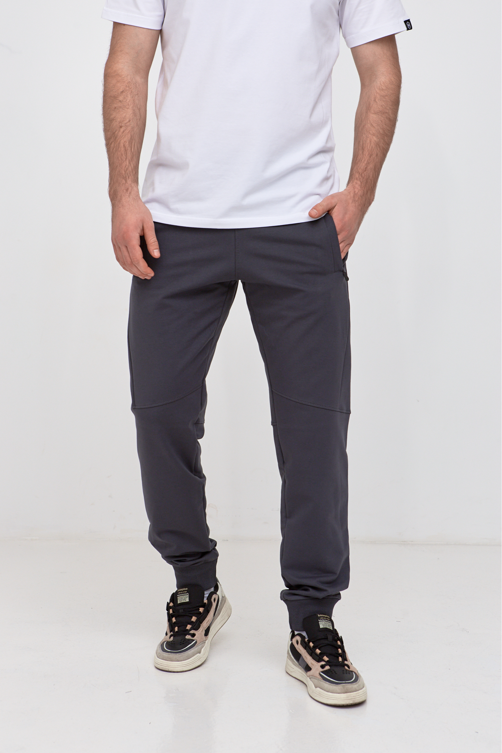 Брюки "резанные" на манжетах с карманами на застежке 19000