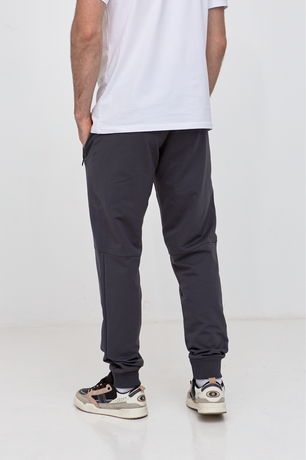 Брюки "резанные" на манжетах с карманами на застежке 19000