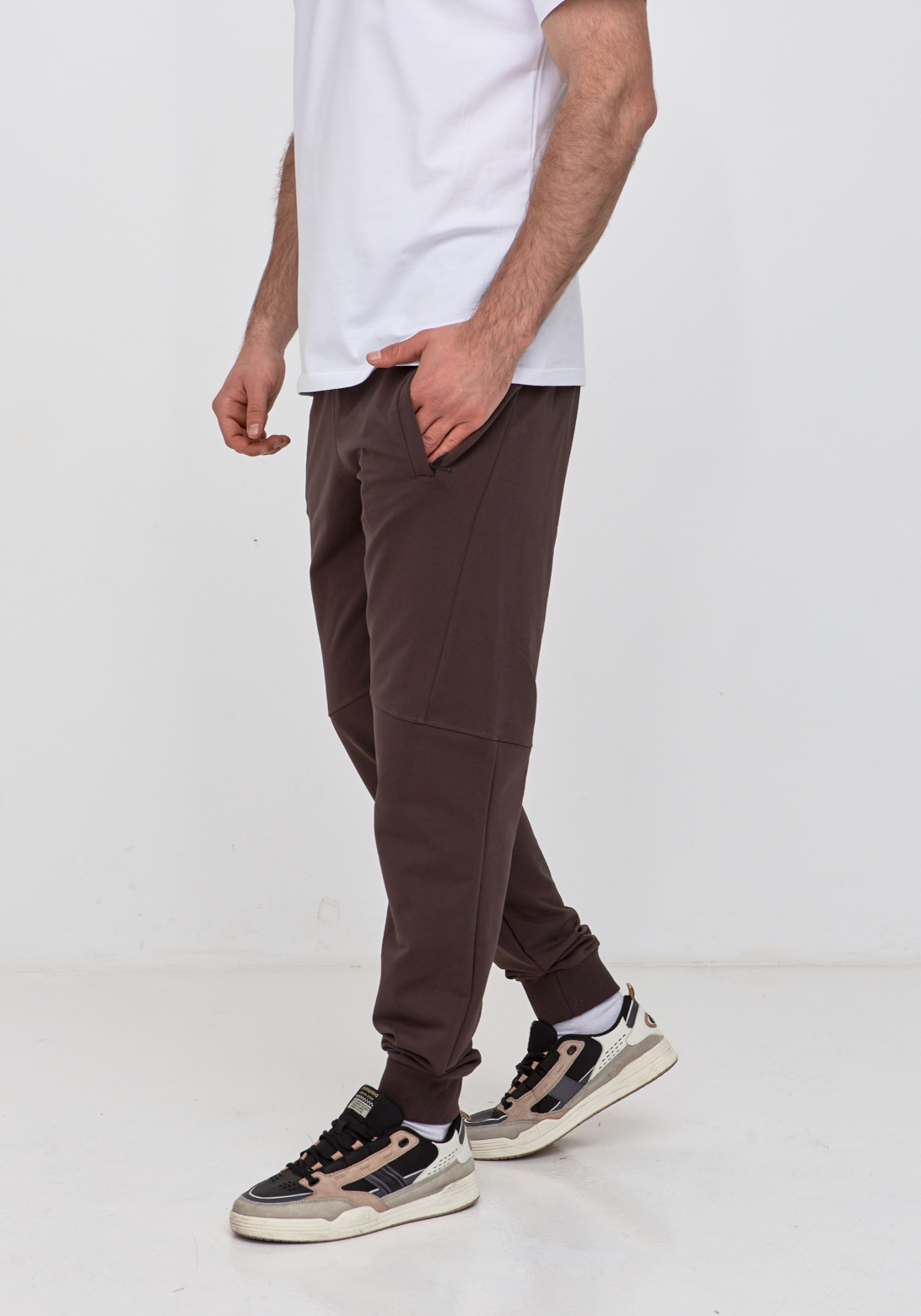 Брюки "резанные" на манжетах с карманами на застежке 19000