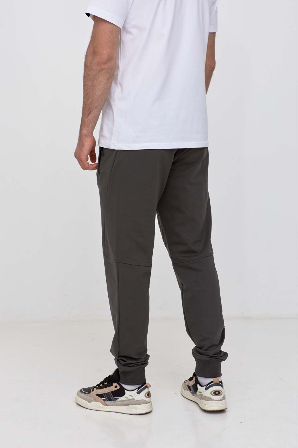 Брюки "резанные" на манжетах с карманами на застежке 19000