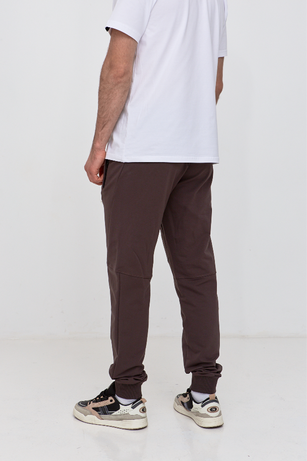 Штани "різані" на манжетах з кишенями на застібці 19000