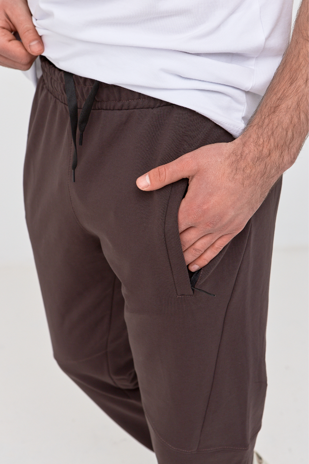 Штани "різані" на манжетах з кишенями на застібці 19000