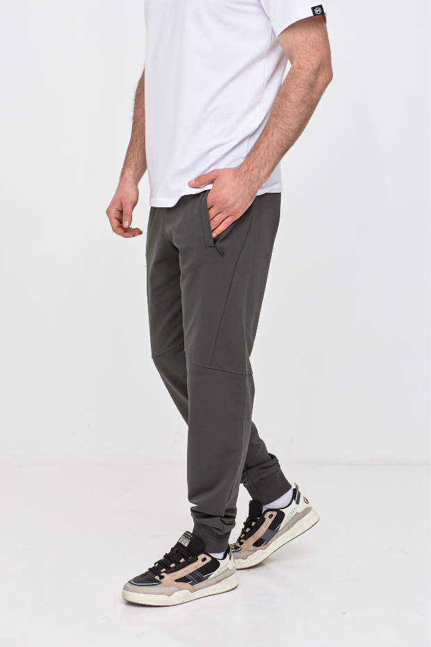 Штани "різані" на манжетах з кишенями на застібці 19000