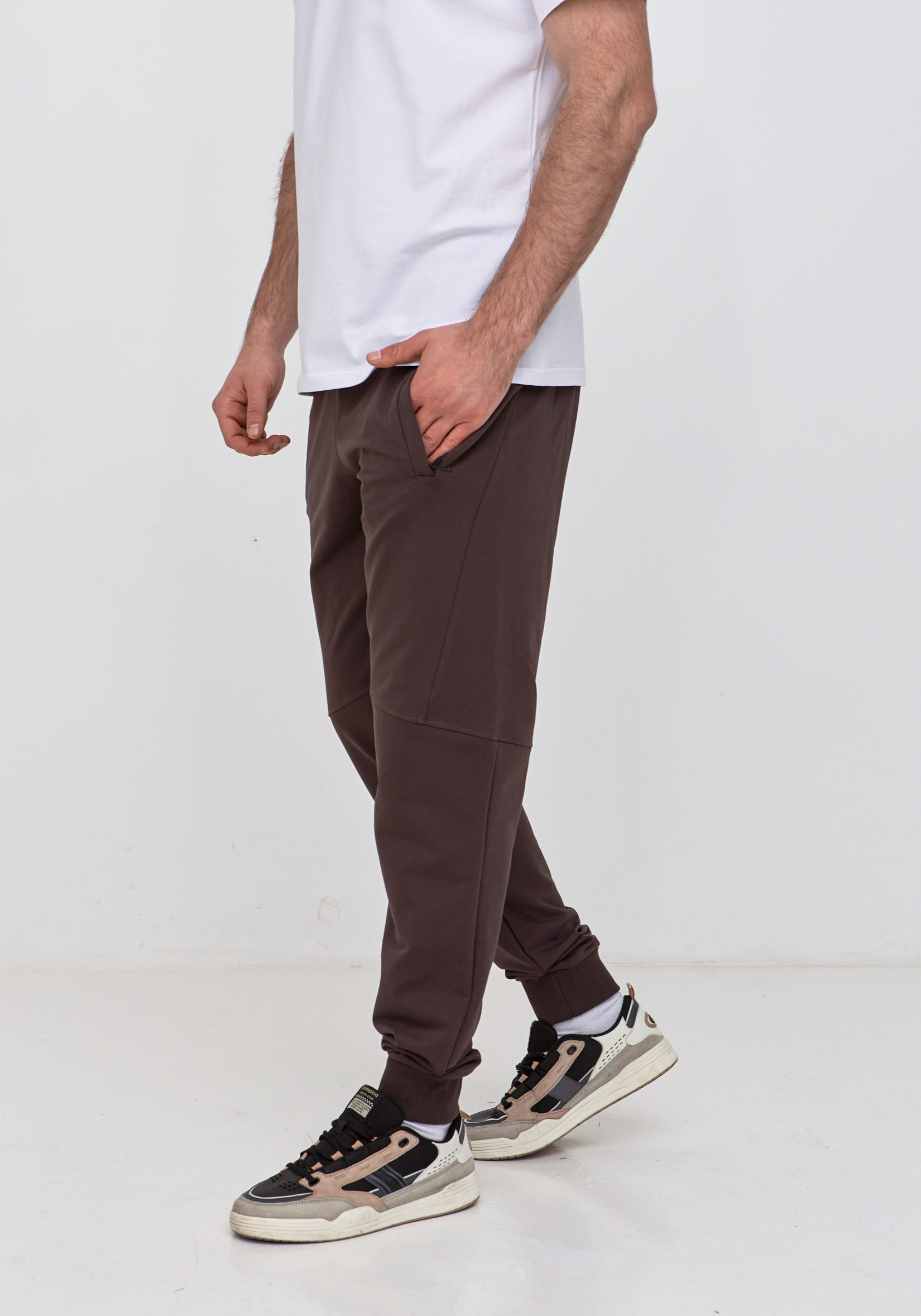 Брюки "резанные" на манжетах с карманами на застежке 19000