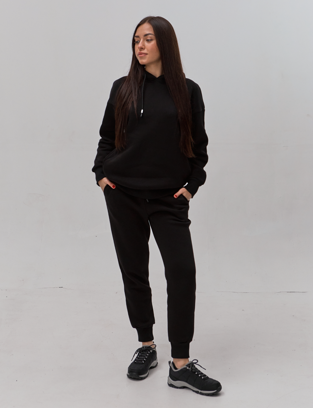 Теплий жіночий костюм із кишенями в бокових швах 24086