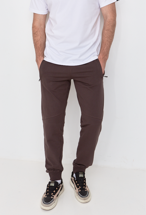 Штани "різані" на манжетах з кишенями на застібці 19000